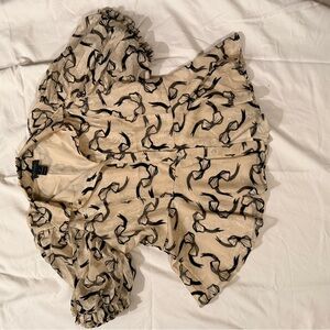 Gracia Elegant Bow Cream and Black Top